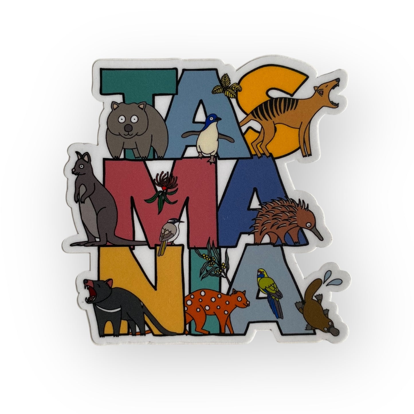 Sticker with animals forming the word 'TASMANIA' on a white background